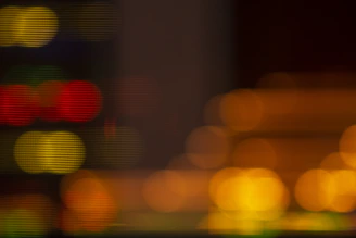 a blurry photo of a city street at night