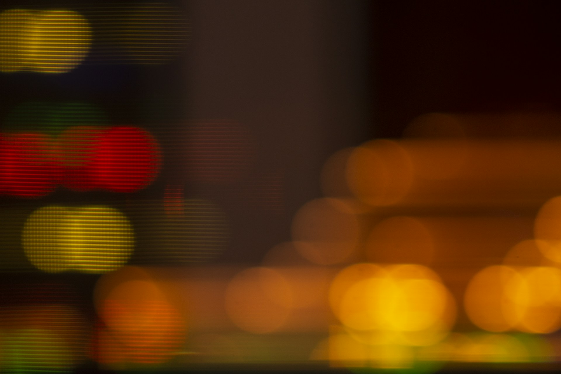 a blurry photo of a city street at night