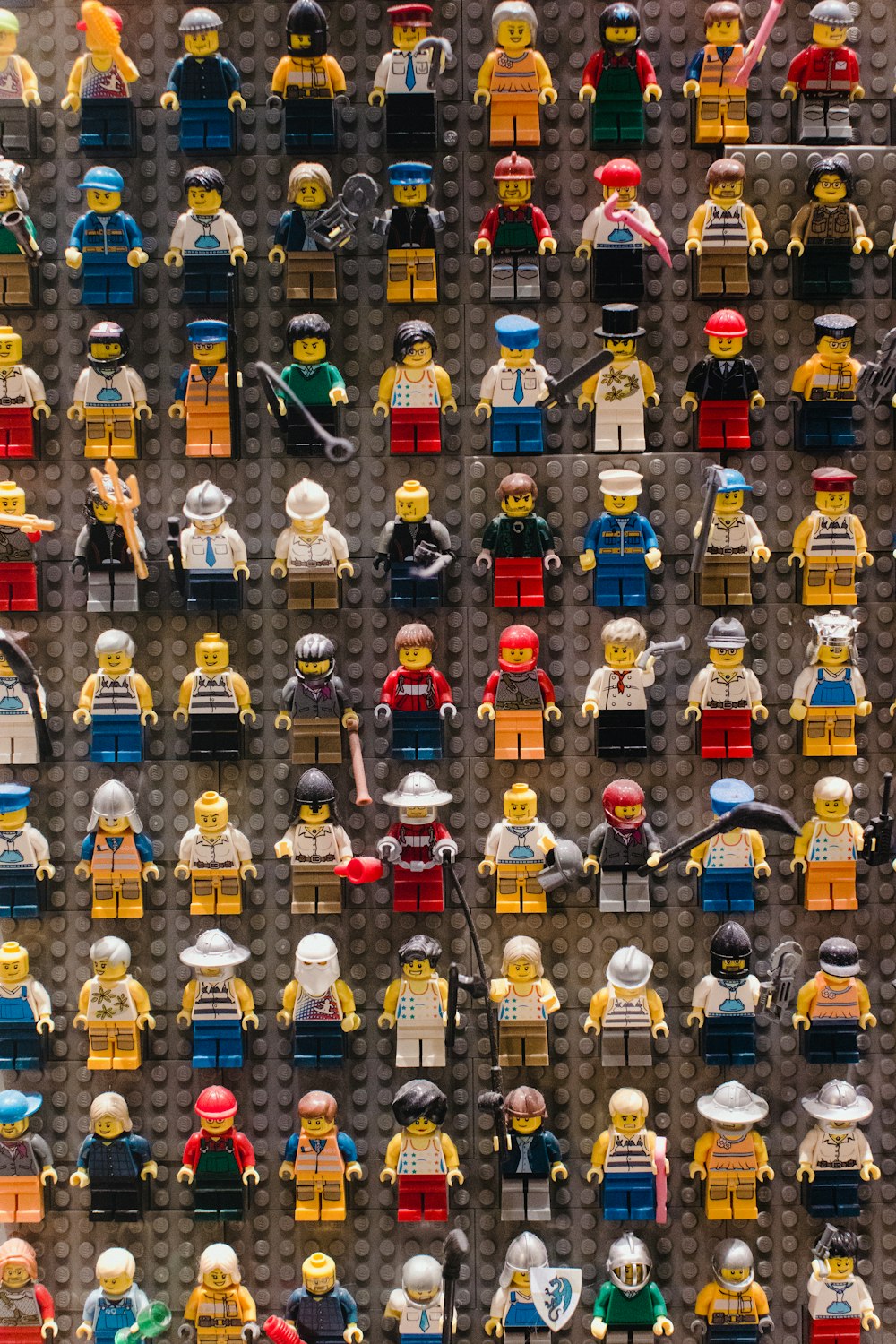 a large display of legos on a wall