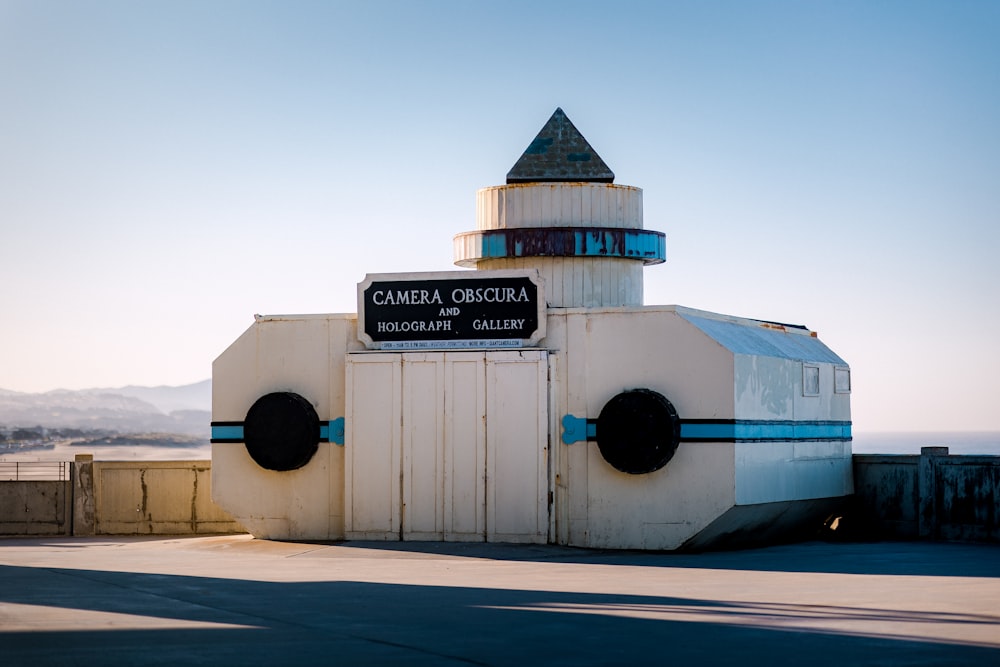 a white building with a tower on top of it