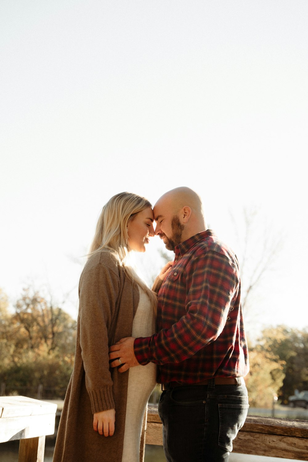 a man and woman standing next to each other