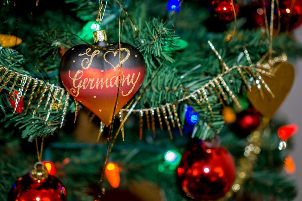 a close up of a christmas tree with ornaments