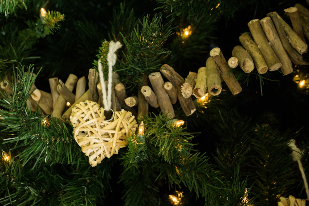 a close up of a christmas tree with ornaments on it