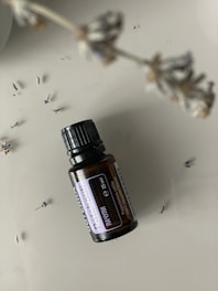 Close-up of fresh patchouli leaves being distilled in traditional copper stills.