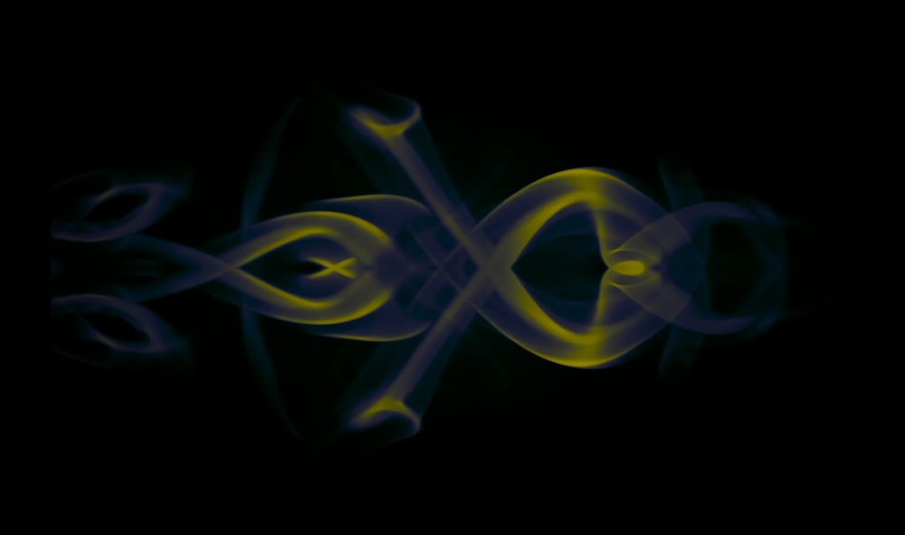 a black background with yellow and blue smoke