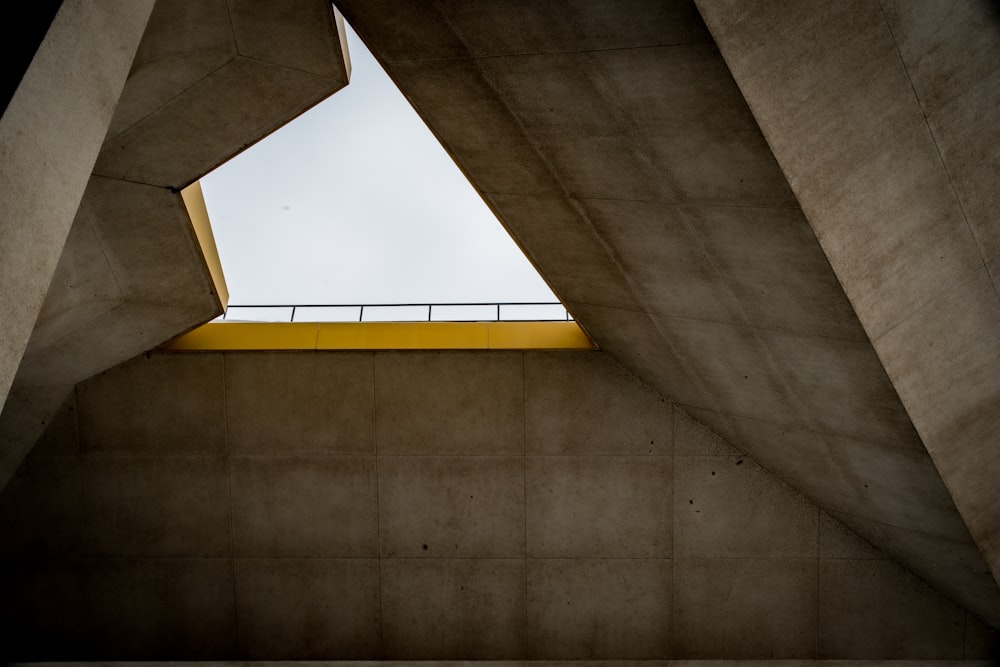 a concrete structure with a skylight above it