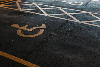 a parking space with a handicapped sign painted on it