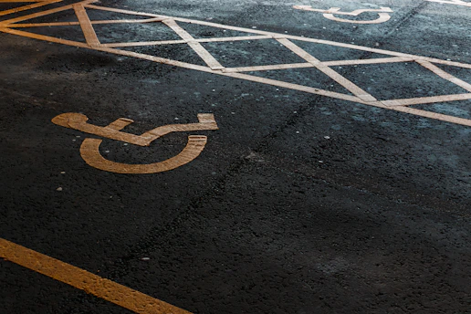 a parking space with a handicapped sign painted on it