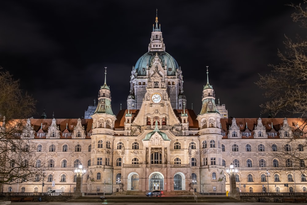 a large building with a clock on the top of it