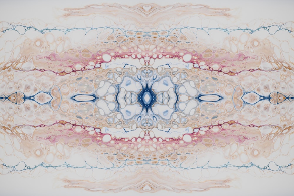 an abstract image of a blue and pink flower