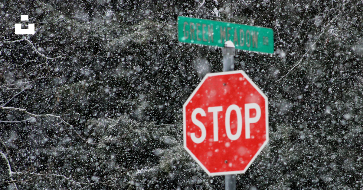 Stop Sign Under Sign A red stop sign sitting under a green street sign photo – Free Symbol ...