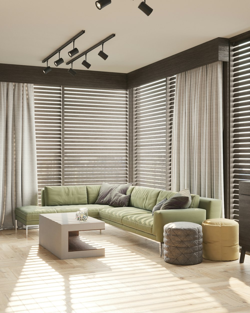 a living room with a green couch and a white coffee table