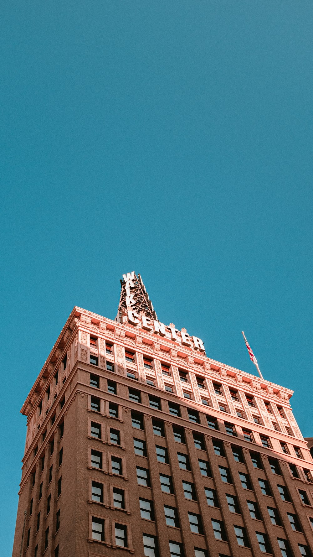 a very tall building with a sky in the background