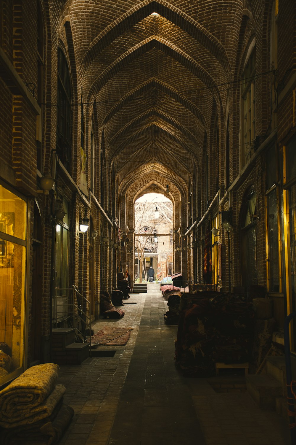 a very long hallway with a bunch of stuff on the floor