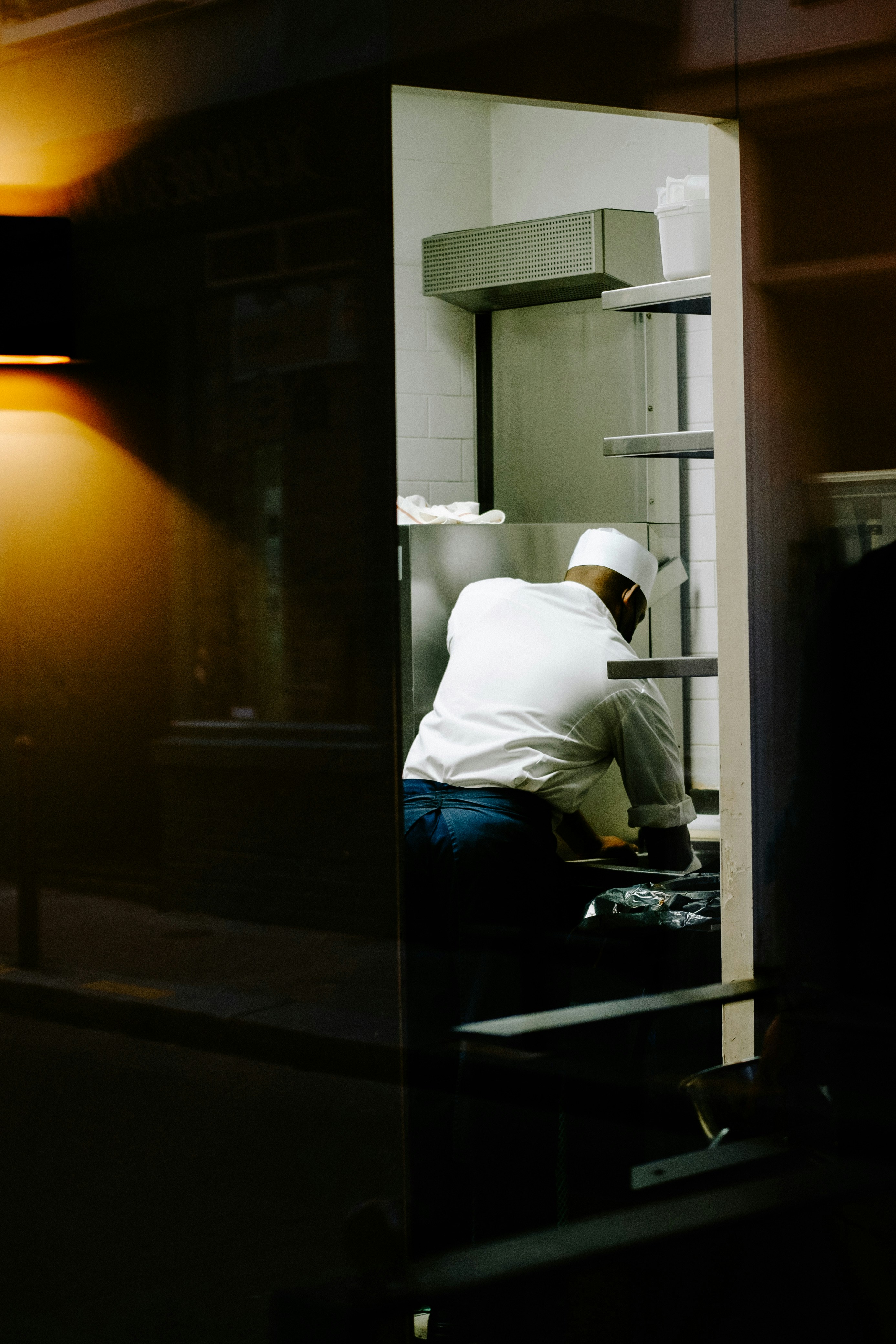 Makini Refrigeration technician servicing a commercial cooling unit