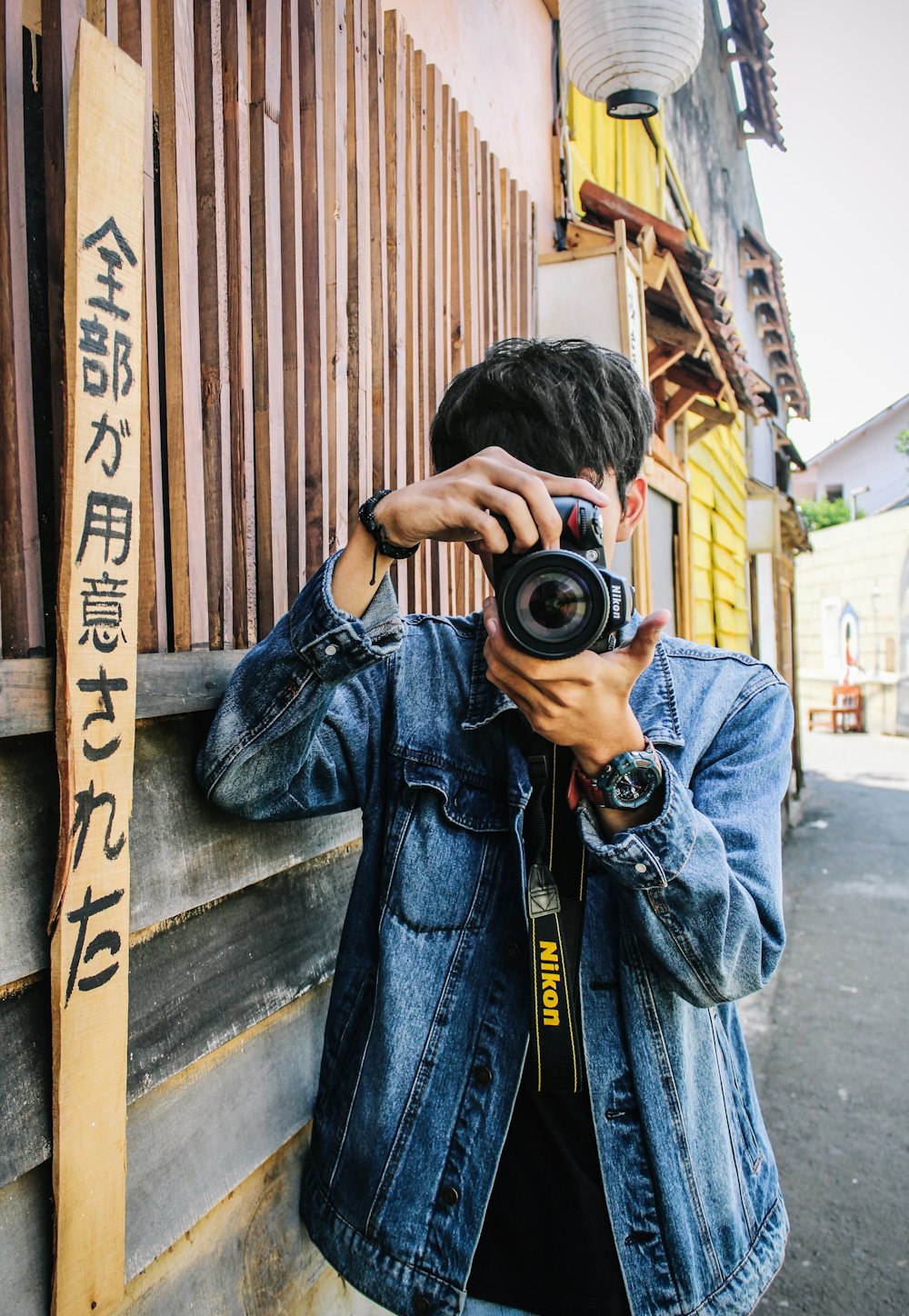 a man taking a picture of himself with a camera