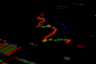 a close up of a computer screen with a dark background