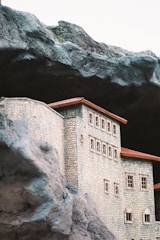 a model of a castle on a rocky cliff