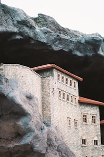 a model of a castle on a rocky cliff