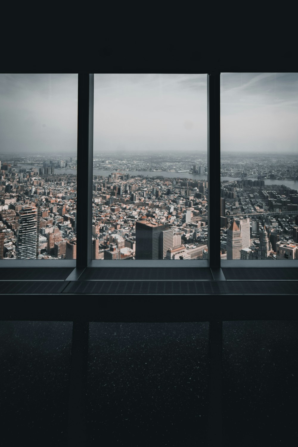 a large window with a view of a city