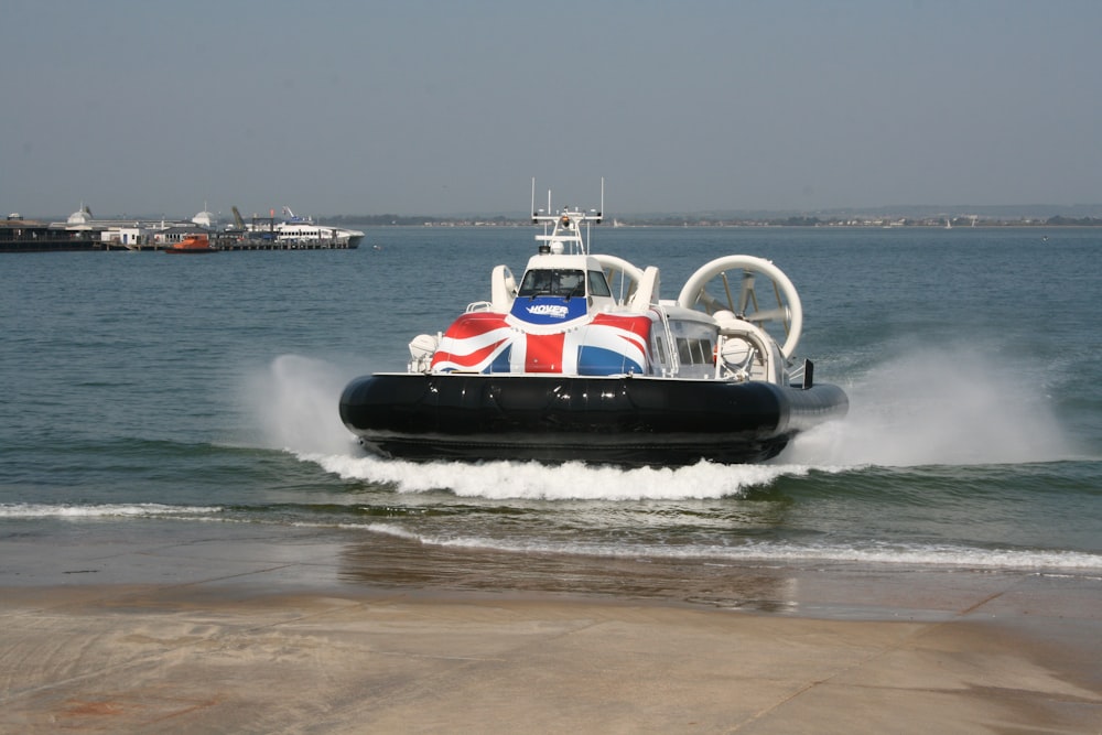 a black and white boat in the water