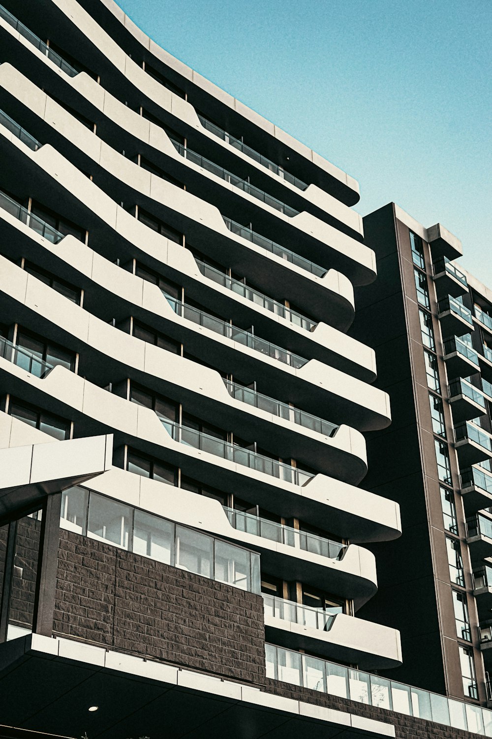 a tall building with balconies and balconies on it