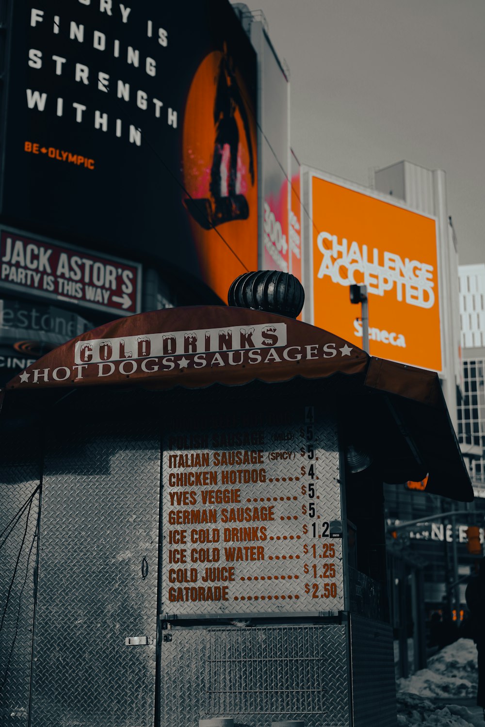 a bunch of signs that are on the side of a building