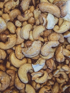 Photo of premium Vietnamese cashews being carefully sorted in a bright, clean facility.