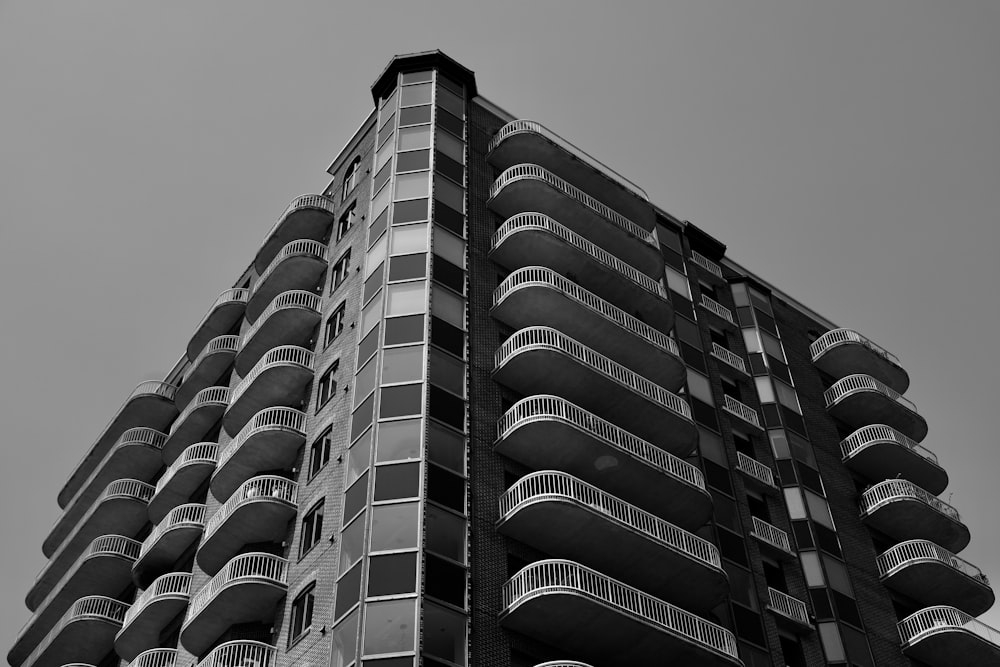 a tall building with balconies and balconies on it