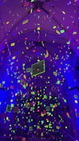 An immersive set design with bold shapes and vibrant colors, creating a theatrical atmosphere.