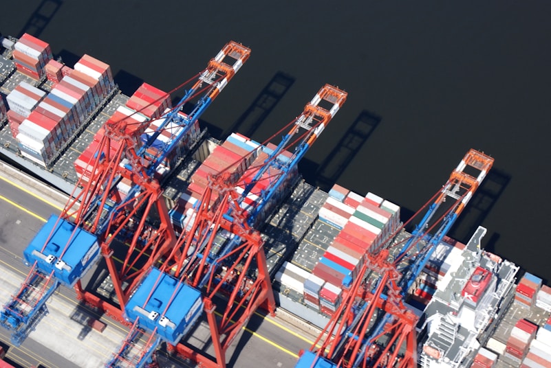 a cargo ship is loaded with containers at the dock