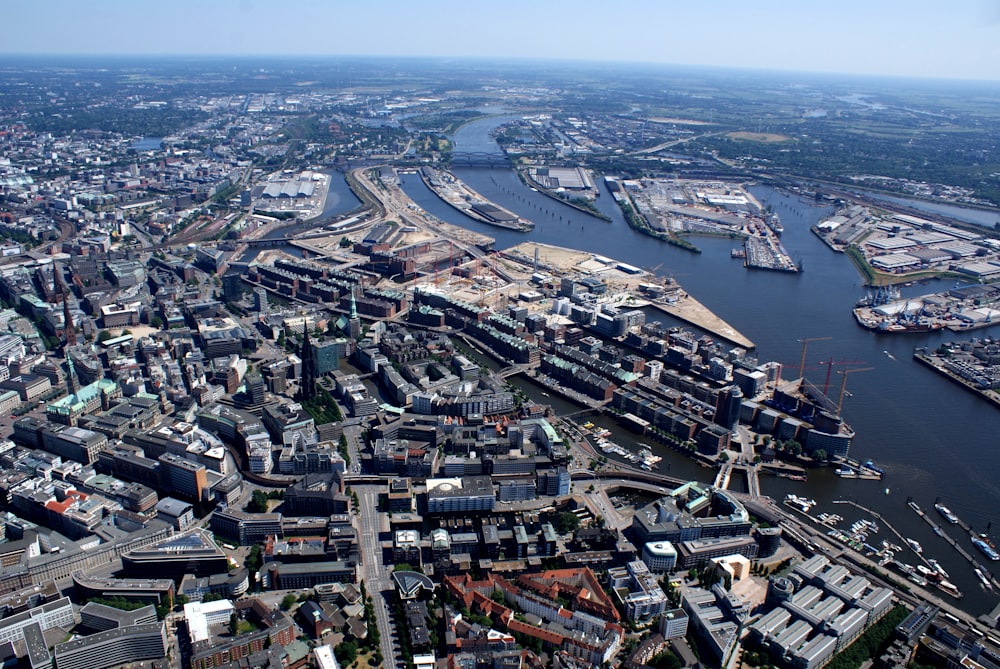 an aerial view of a city with a river running through it