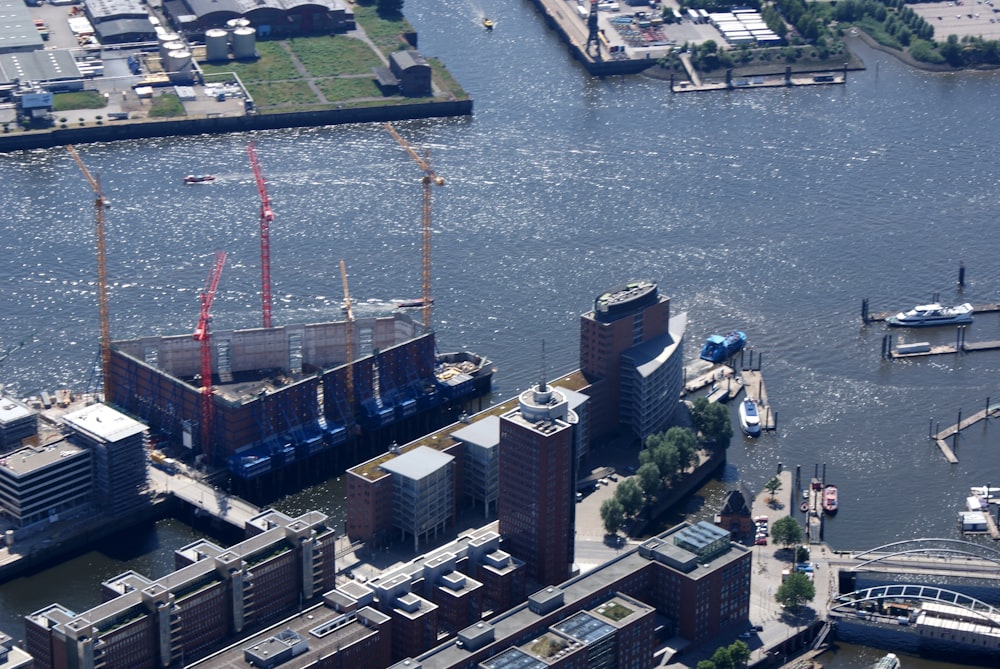 a large body of water with a city in the background