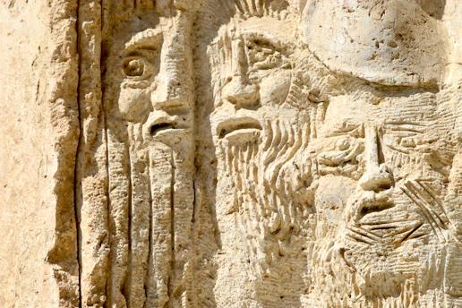a close up of a carving on a wall