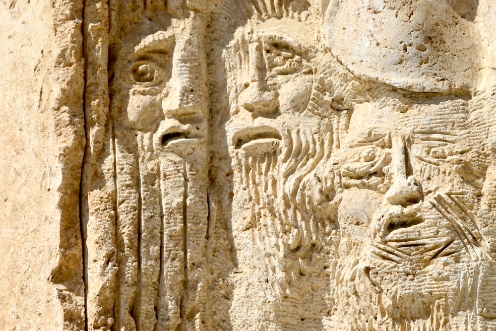 a close up of a carving on a wall