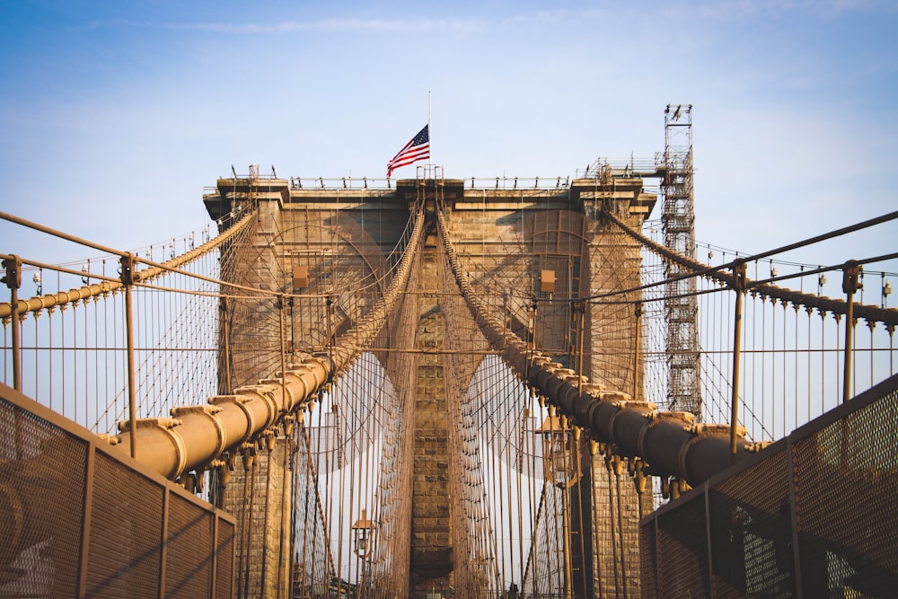 a view of a bridge with a flag on top of it