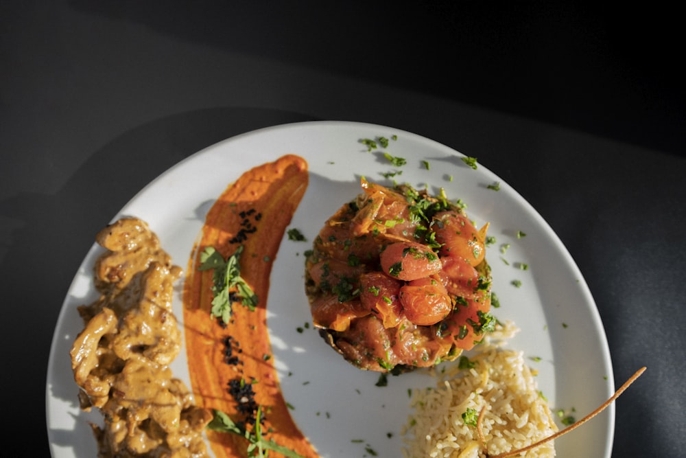 a white plate topped with different types of food