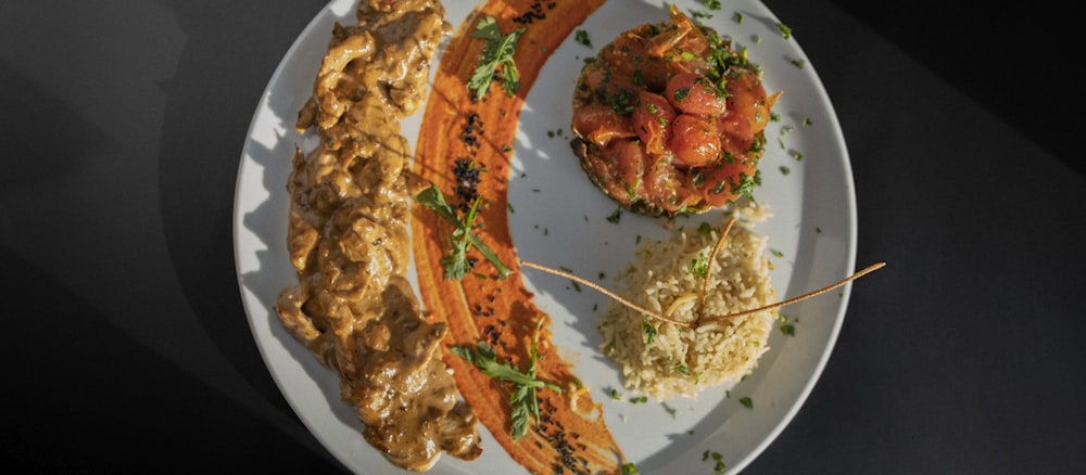 a white plate topped with different types of food