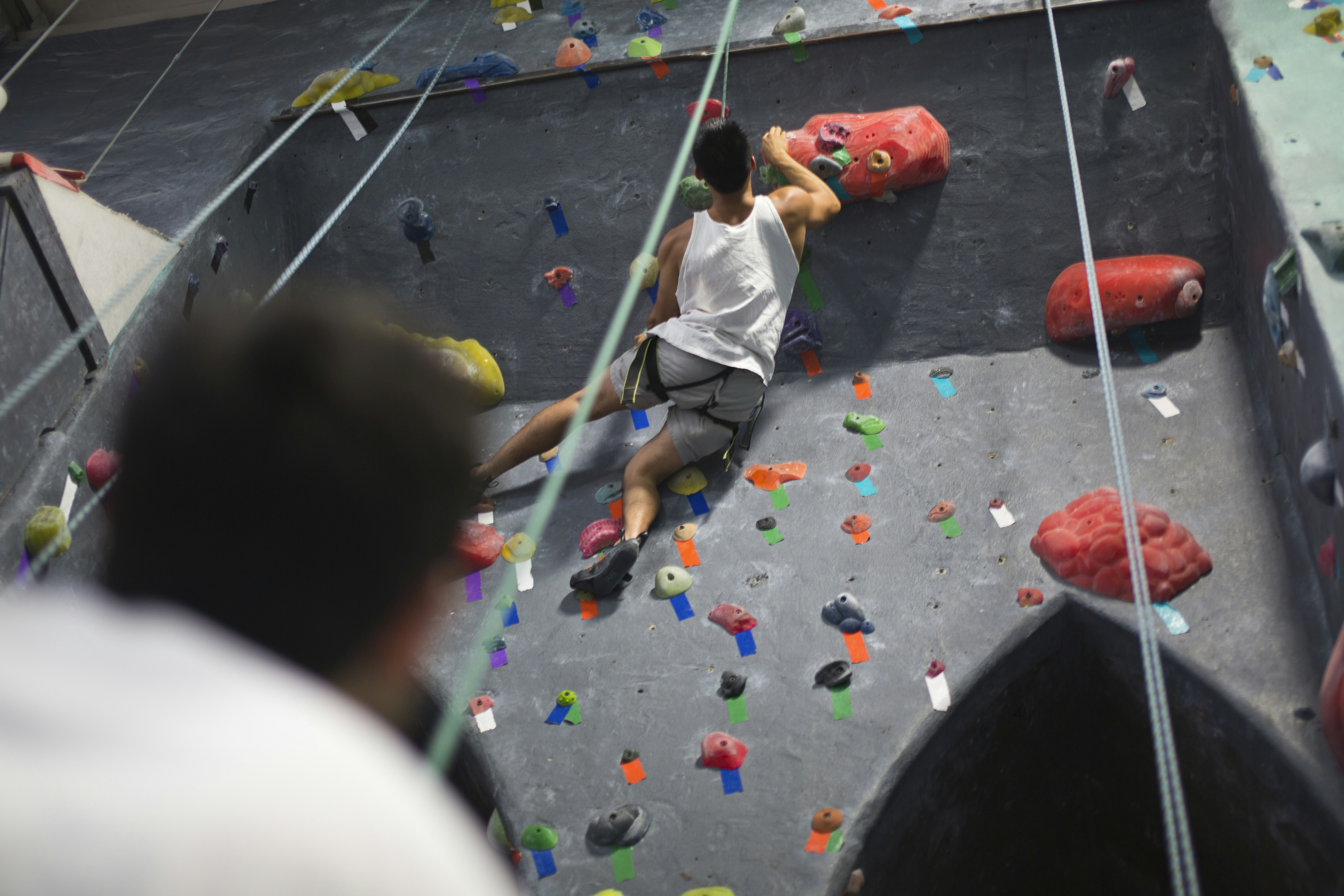 Athlete training on climbing wall