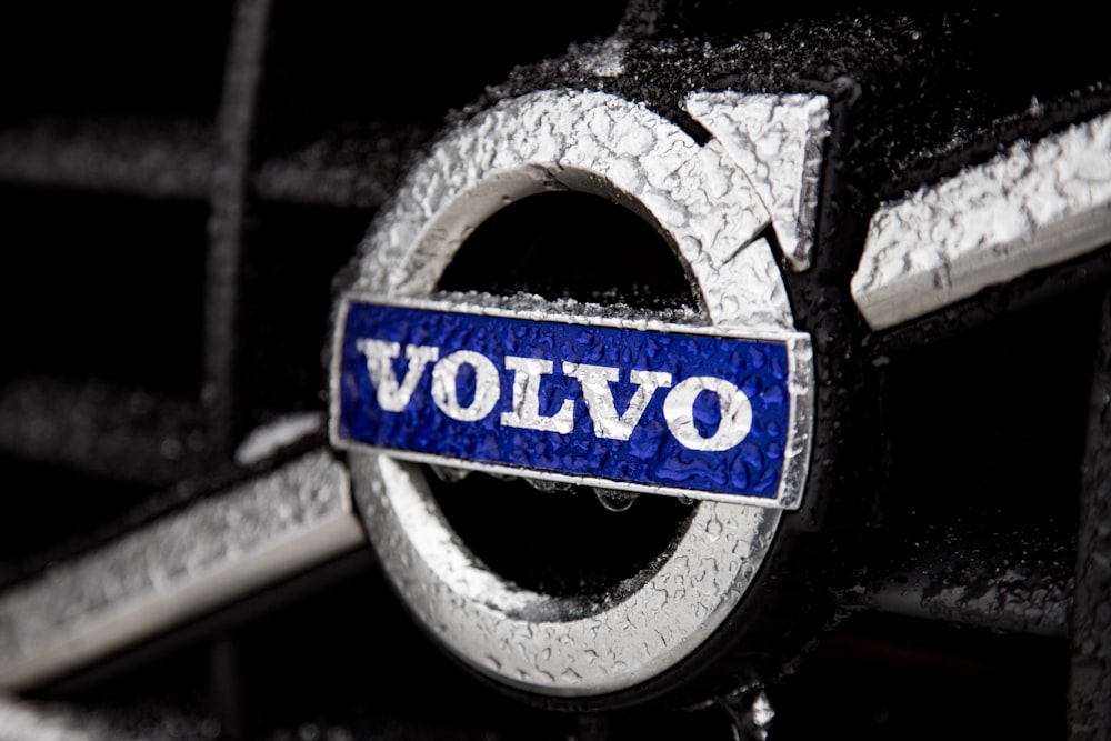 a close up of a volvo emblem on a car