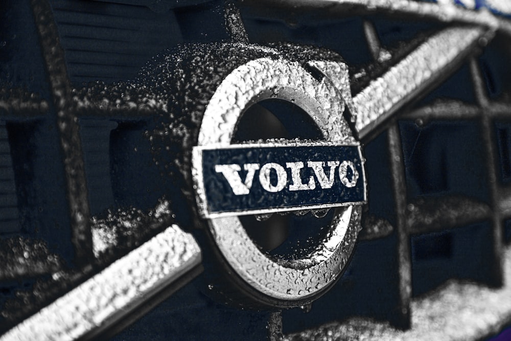 a close up of a volvo emblem on a car