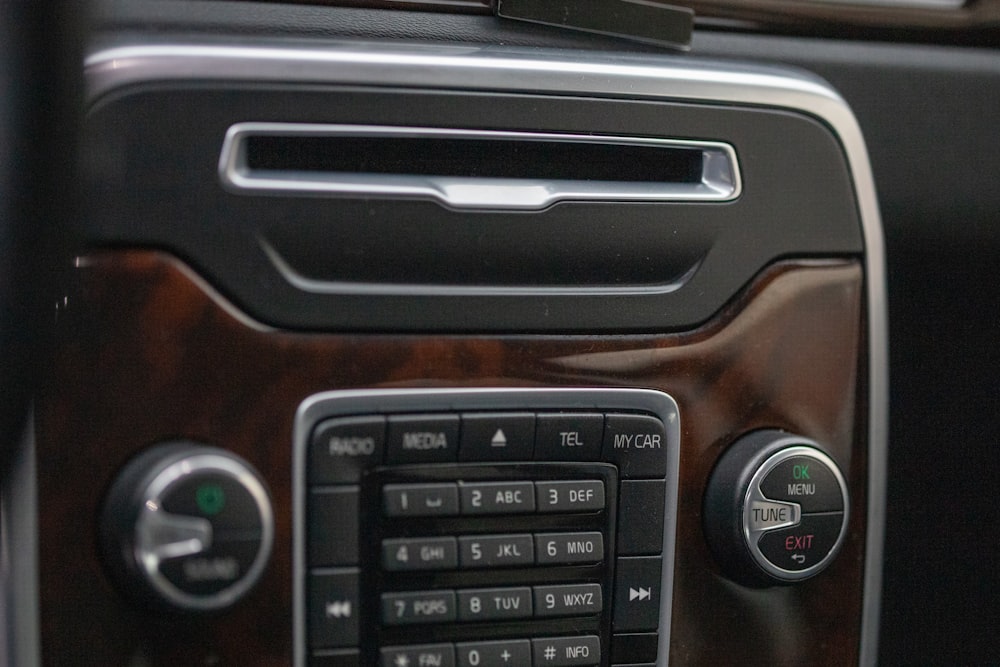 a close up of a radio in a vehicle