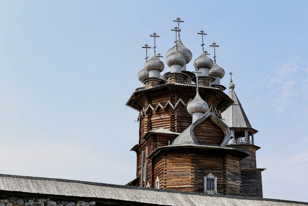an old wooden church with three spires