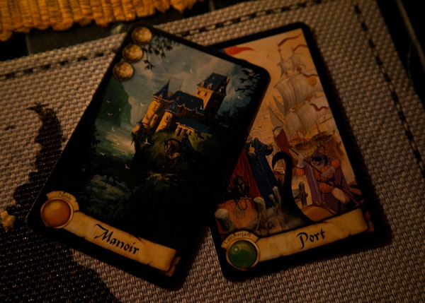 Two playing cards on a tabletop