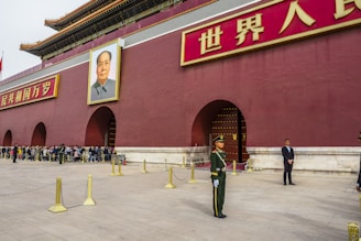 a group of people standing in front of a building