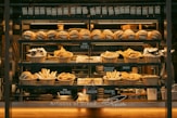 a bakery filled with lots of different types of bread