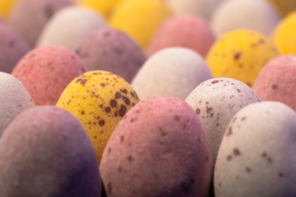 a group of different colored bath bombs