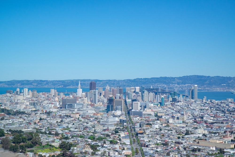 a view of a city from the top of a hill