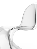 a white chair with a curved back and seat