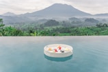 a table that is in the middle of a pool